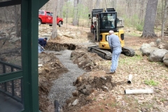 dyer-septic-excavation-norris-job-eployee-inspect-ditch